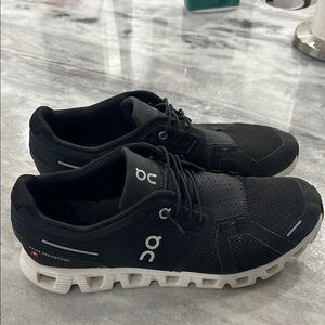 On Running Black and White Athletic Shoes